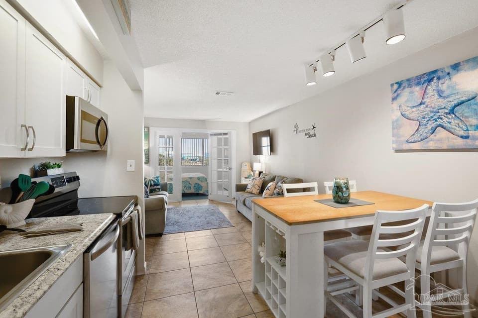 7453 Sunset Harbor Dr # 302, Navarre Beach FL 32566 photo 1