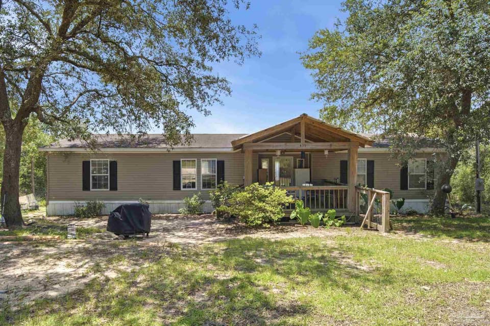 439 Woodpecker Ln, Holt FL 32564 photo 1